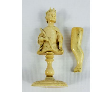 Antique Ivory Chess Piece, together with a pipe stamper in the form of a shapely leg. (af)