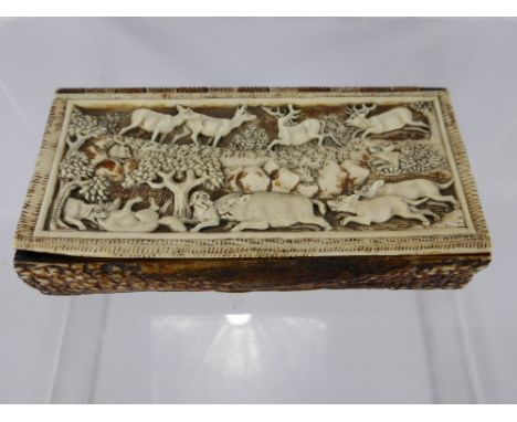 An Antique Continental Ivory and Stag Horn Table Snuff Box, depicting a hunting scene in relief, with green tortoiseshell int