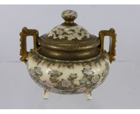 A 19th Century Japanese Porcelain Pot and Cover, with very fine floral decoration depicting peony and butterflies, red catalo