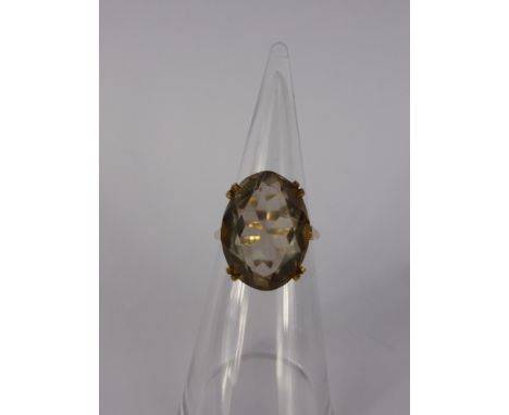 A 9 Ct Quartz Lady's Ring, quartz 20 x 15 mm, size Q, approx 7 gms.