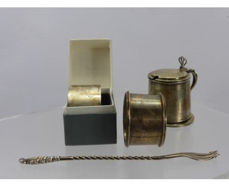 A Victorian Silver Pickle Fork, Birmingham hallmark, mm William Devenport together with two napkin rings, Birmingham hallmark