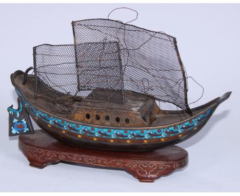 A Chinese silver coloured metal and enamel model, of a junk, hardwood stand, 21.5cm long 