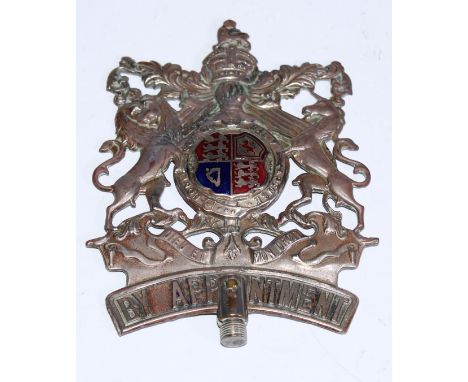 A George V silvered copper and enamel Royal coat of arms, fitted as a staff head or finial, inscribed By Appontment, 11cm lon