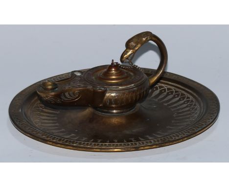 A Grecian Revival gilt brass inkwell, after the antique in the Grand Tour manner as a Classical lamp, flying-scroll handle te
