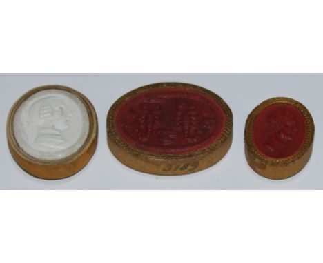 Three 18th century Grand Tour oval intaglio impressions, comprising a Tassie-type portrait profile of the antiquary Sir Willi