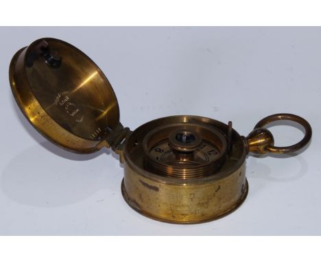 A late 19th century lacquered brass night watchman's time recorder, hinged cover enclosing clock mechanism, marked Original E