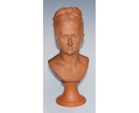 A 19th century terracotta portrait bust, of a lady of rank, possibly royal, by J.M. Mohr, signed and dated 1874 in sgraffito,