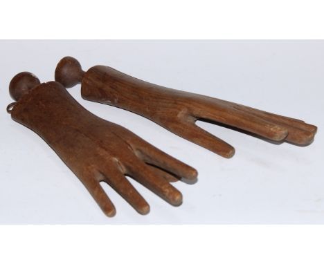 Treen - a pair of tailor's beech mannequin hand trees or glove-making stretchers, 31.5cm long, 19th century 