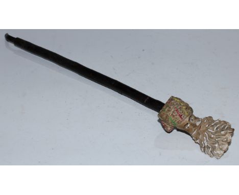 A 19th century French clay pipe, by Maison Gambier, Paris, modelled as the head of Jacob, design no. 948, rustic stem, 43cm l
