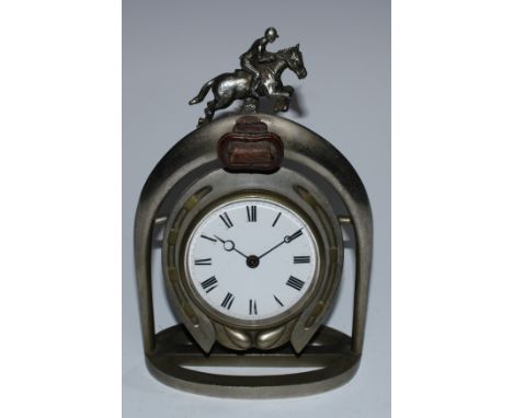 An early 20th century mantel timepiece, of equestrian interest, the 8.5cm enamel clock dial inscribed with Roman numerals, wi