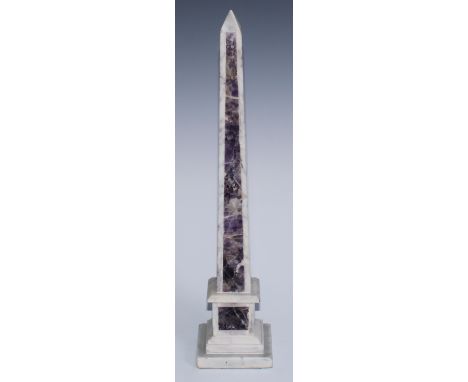 A white marble and amethyst quartz library desk obelisk, 39.5cm high 