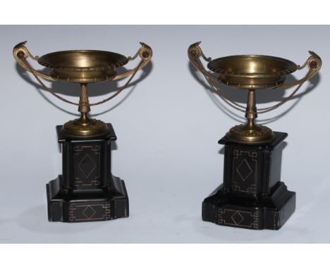 A pair of 19th century brass saucer shaped pedestal mantel tazzas, acanthus scroll handles, architectural black marble bases,
