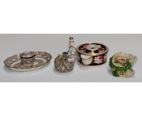 A 19th century French porcelain inkstand, in the manner of Sèvres, painted with purple violets and laurels, alternating gilt 