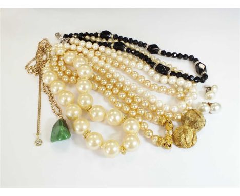 A collection of costume jewellery; comprising; a uniform cultured pearl necklace, three simulated pearl necklaces, a cubic zi