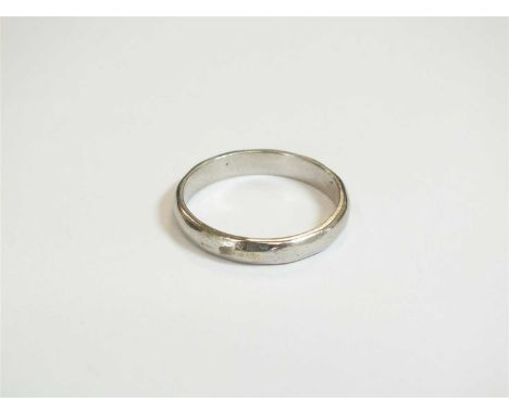 A white metal wedding band, stamped 'ACco' 'P', ring size L, weight approx 3.8g