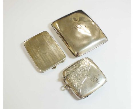 A silver cigarette case, F H Adams &amp; Co, Birmingham 1923, together with a silver vesta case, T H Hazelwood &amp; Co, Birm