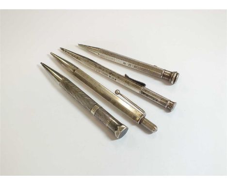 A silver engine turned retractable pencil, Sampson Mordan &amp; Co, London 1936, together with a faceted plain polished retra