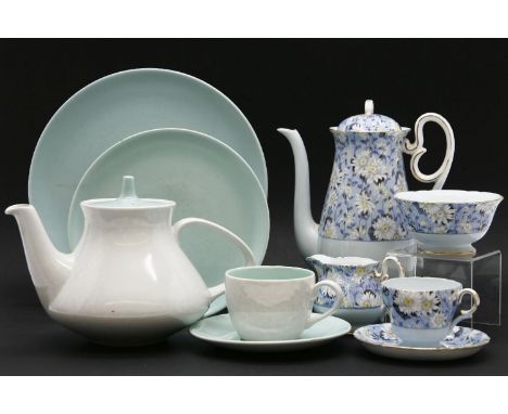 A Shelley tea set, the blue ground with daisy decoration, and a collection of Poole pottery dinnerware