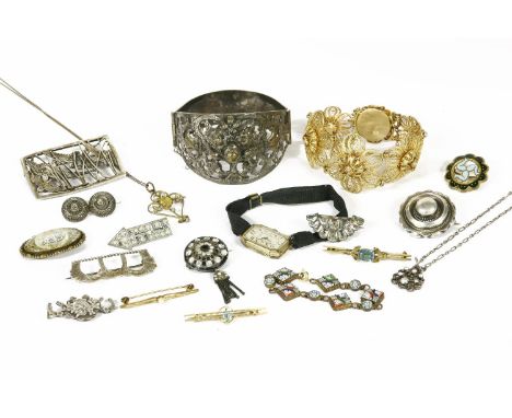 A collection of costume jewellery, to include a Portuguese silver gilt filigree floral panel bracelet, an Edwardian gilt meta