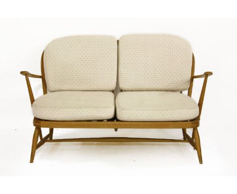 An Ercol two-seater settee, 130cm wide