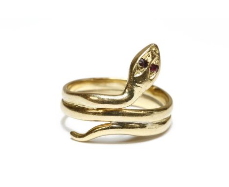 A gold snake ring, with ruby set eyes, tested and valued as 18ct gold, Len Wilson Jewellers2.91g