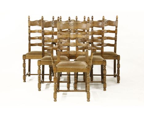 A set of six oak ladder back dining chairs
