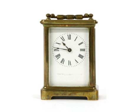 A brass cased carriage clock by Webster & Co & Jenner, platform escapement and white dial and key, together with a German wal