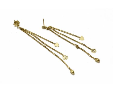 A pair of high carat gold three row chain drop earrings, each curb link chain ending in a decorative finial (tested as approx