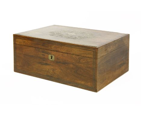 A 19th century rosewood workbox, with inlaid brass work, inscribed 'Margaret', the interior with ivory and mother of pearl fi