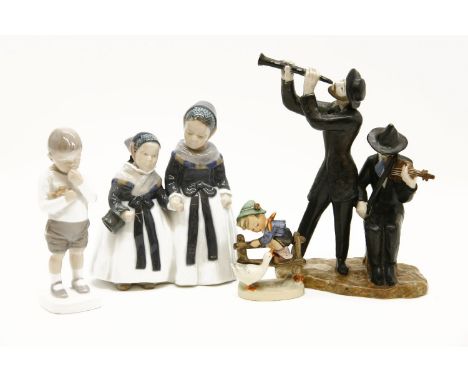 A Royal Copenhagen figure of a young boy, two Royal Copenhagen children, a Goebel figure of a child, and another figure