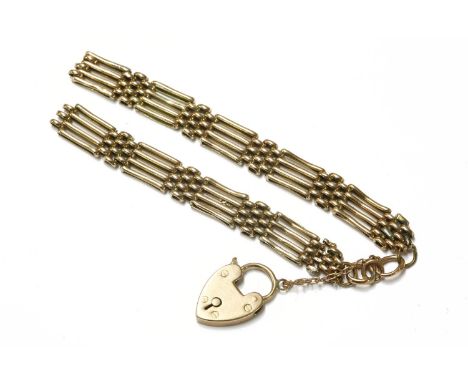 A 9ct gold four row gate link bracelet with padlock, (damaged, with links missing)11.61g