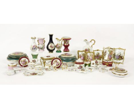 A collection of 20th century Limoges porcelain, to include boxes and covers, plates, vases, etc.