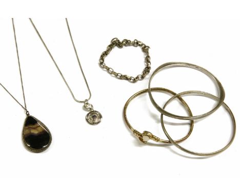 A collection of costume jewellery, to include a silver modernist slave bangle, marked AG, and another silver 'D' section slav