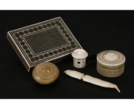 Ivory items: ornamental engine turned box, pea pod needle case, tape measure, Eastern card case and a 'vegetable ivory' carvi