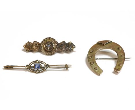 A 9ct gold horseshoe brooch, (pin not gold), an Edwardian gold blue paste stone and split pearl bar brooch, marked 9ct (pin n