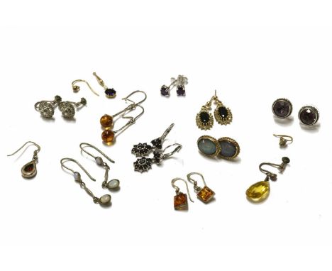 A collection of earrings to include, a pair of opal triplet cabochon earrings (tested as approximately 9ct gold), a pair of 9