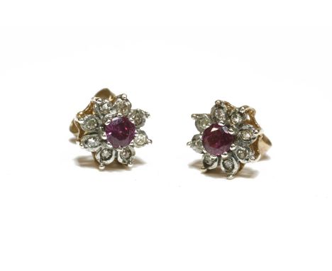 A pair of 9ct gold circular cut ruby and diamond cluster earrings, 1.75g