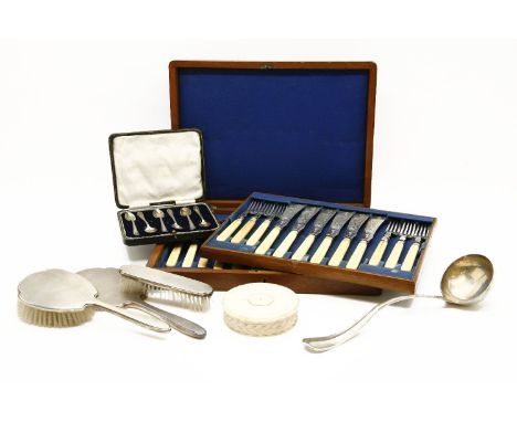 A cased sets of hallmarked silver teaspoons, a three piece silver dressing table set, a plated ladle, an ivory lidded pot, an