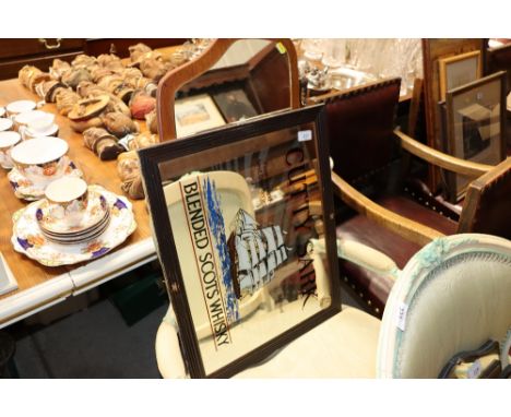 A Cutty Sark blended Scotch Whisky advertising mirror; and a teak effect wall mirror