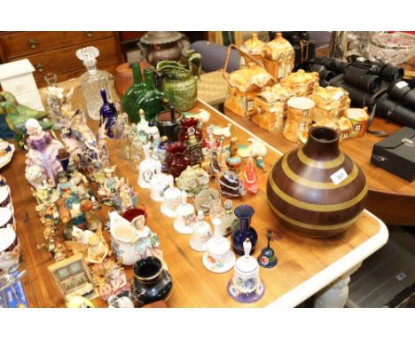 A quantity of glass and china bells; various scent bottles; a vintage ice bucket etc.