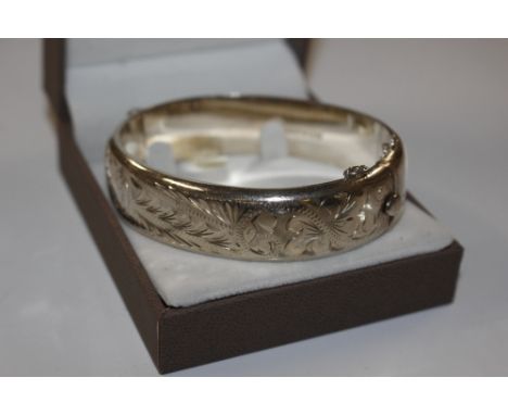 A Sterling silver hinged bangle Birmingham 1965 RPH Jewellery Co. total weight approx.. 25gms 