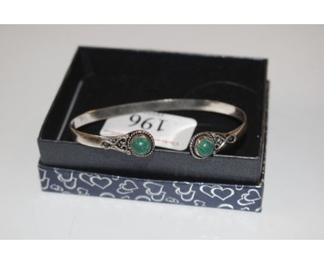 A 925 marked silver and malachite bangle 