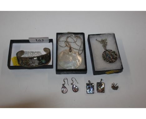 Two Sterling silver and mother of pearl set pendant necklaces, ear-rings and a bangle 