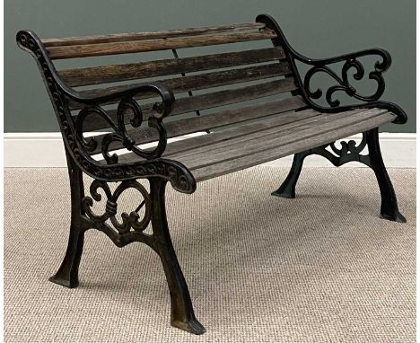 GOOD GARDEN BENCH with cast metal ends and wooden slats, 77 (h) x 130 (w) x 68cms (d)Provenance: private collection Conwy