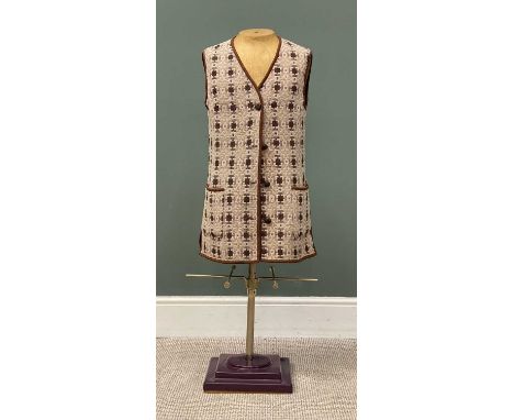 MID-CENTURY DRESSMAKER'S MANNEQUIN, on a metal column and stepped square plastic base, 120cms (h), with a Welsh tapestry wais