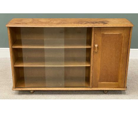 MID-CENTURY BOOKCASE, in the manner of Ercol, with glass sliding doors, labelled 'Priory', 86 (h) x 138 (w) x 35cms (d)Proven