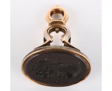 An Antique hardstone ring stone, intaglio carved depicting Aristotle, in unmarked gold fob mount, seal measures 16.3mm x 14mm