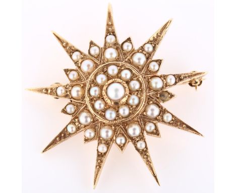 A large Victorian pearl 9-rayed starburst pendant/brooch, unmarked gold closed-back settings set with split pearls, pendant d