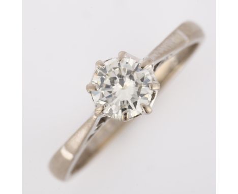 An 18ct white gold 0.65ct solitaire diamond ring, claw-set with modern round brilliant-cut diamond, colour approx I/J, clarit