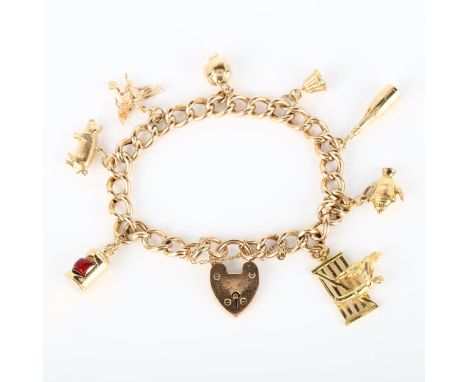 A mid-20th century 9ct gold hollow curb link charm bracelet, with 8 gold charms and heart padlock clasp, bracelet length 18cm
